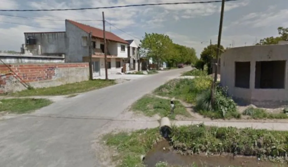 Brutal femicidio: un hombre mató a tiros a su ex en un almacén y prendió fuego el local