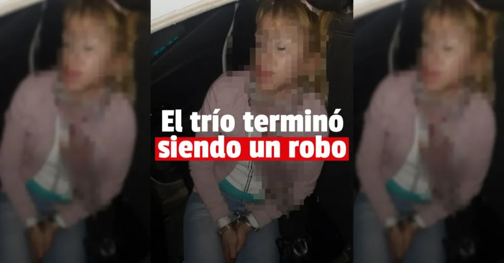 Iban a entrar a un hotel alojamiento y la mujer le robó el teléfono a uno de los hombres